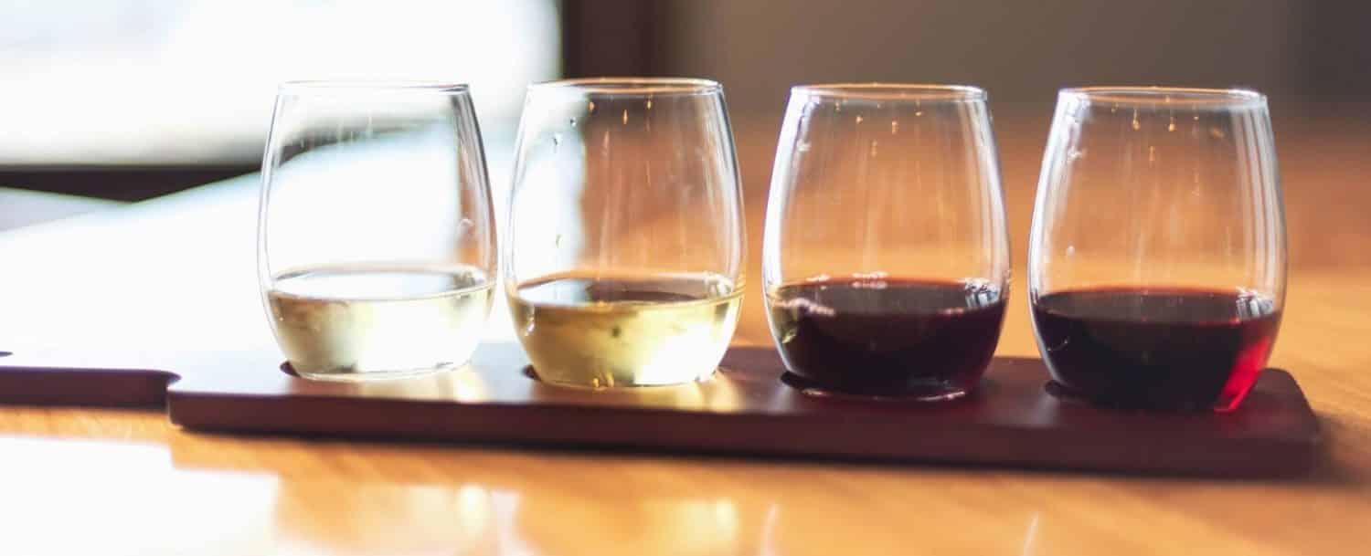 Wine flight on a counter at a winery