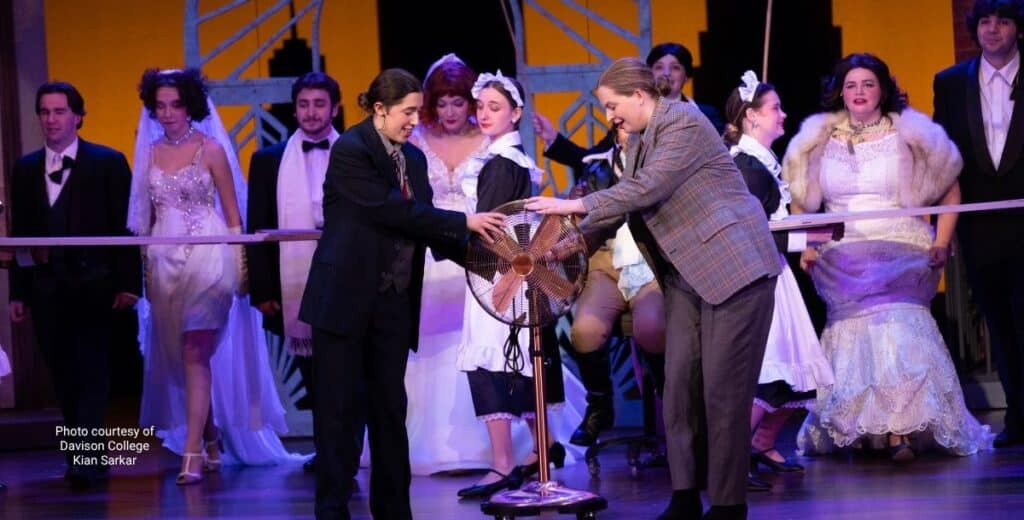 dvi-blog-drowsy-chaperone-193 | Davidson Village Inn Full wedding party cast on stage during The Drowsy Chaperone at Davidson College Theatre.
