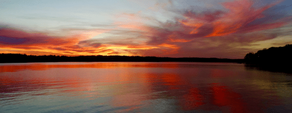 Scenic sunset reflecting across the water at Lake Norman near Davidson, NC