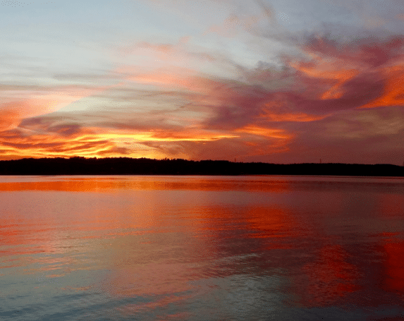 Scenic sunset reflecting across the water at Lake Norman near Davidson, NC