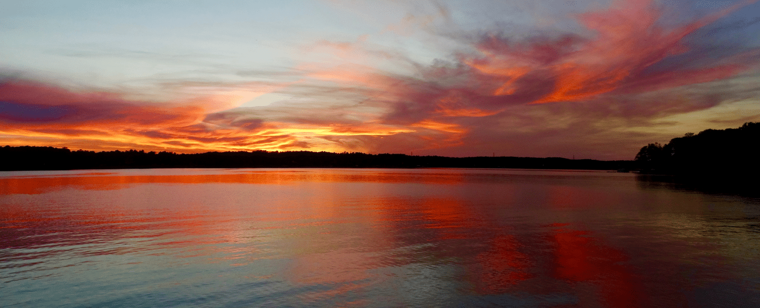 Scenic sunset reflecting across the water at Lake Norman near Davidson, NC