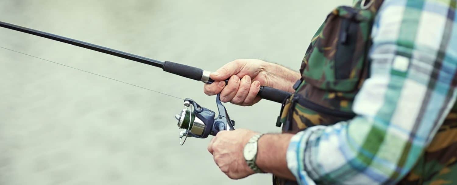 closeup of man with fishing pole