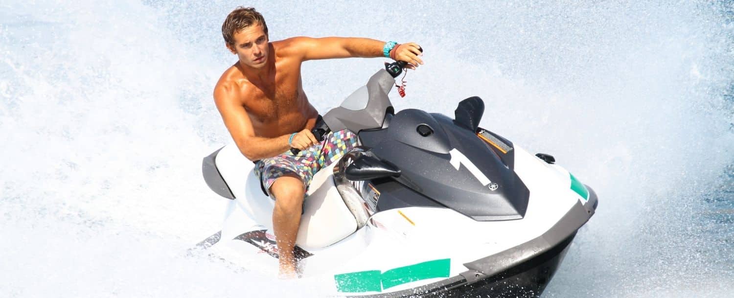 man riding a jet ski