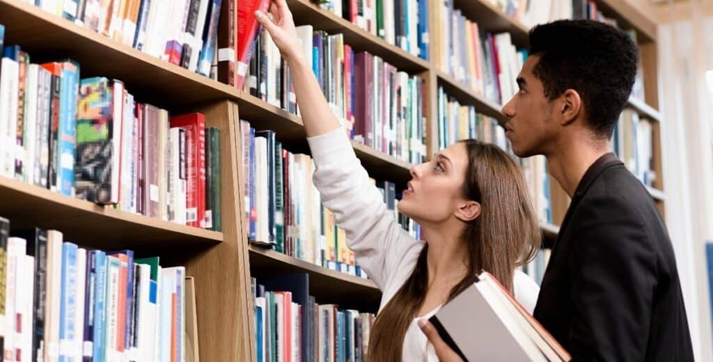 Davidson College students studying together in the campus library while preparing for classes