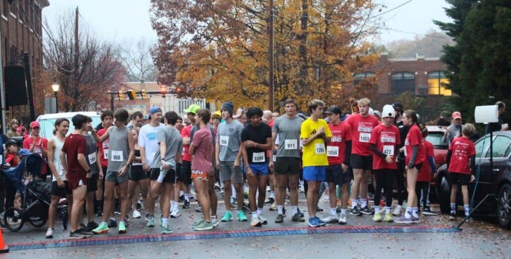 dvi-blog-turkey-trot-starting-line | Davidson Village Inn Runners gather at the starting line for the Davidson Turkey Trot in downtown Davidson.