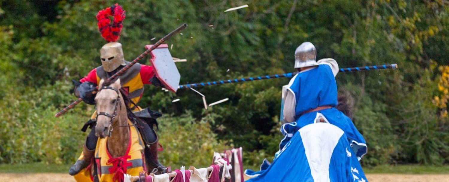 Knights joust on horseback at the Carolina Renaissance Festival in Huntersville, NC.