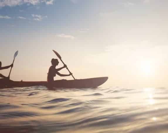 People in a canoe as one of the many Lake Norman activities